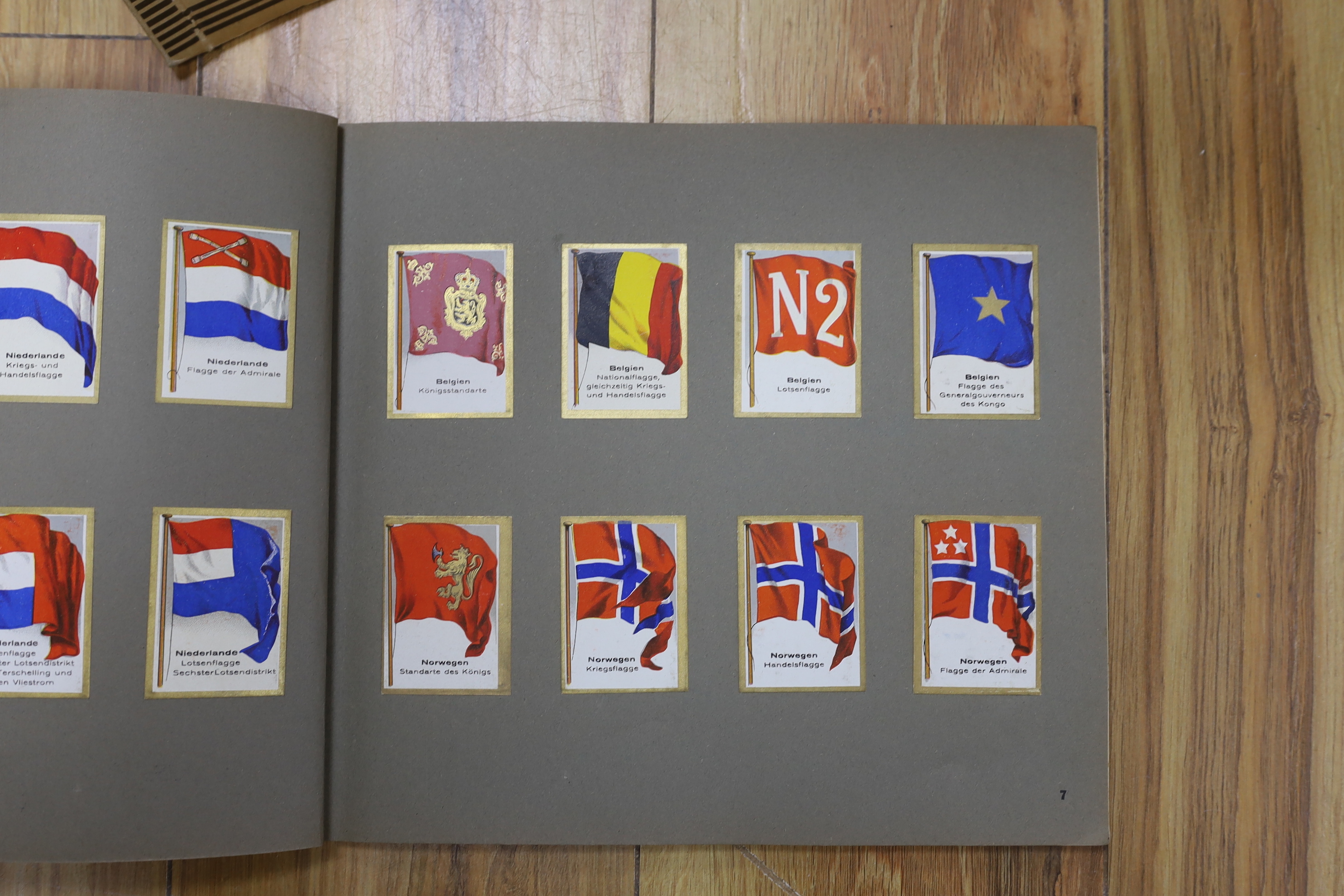 A collection of cigarette cards in albums